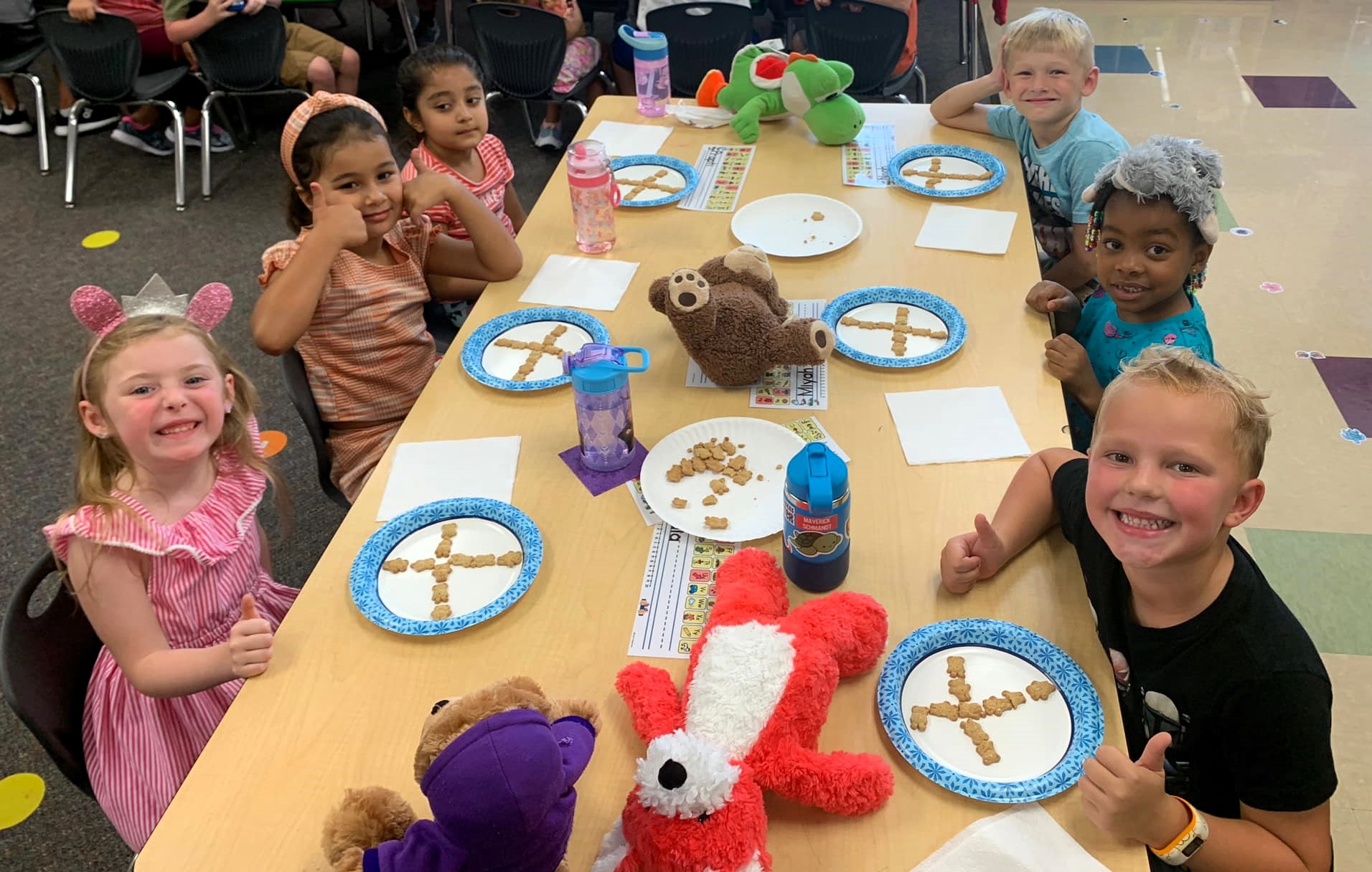 preschool children sitting at snack time