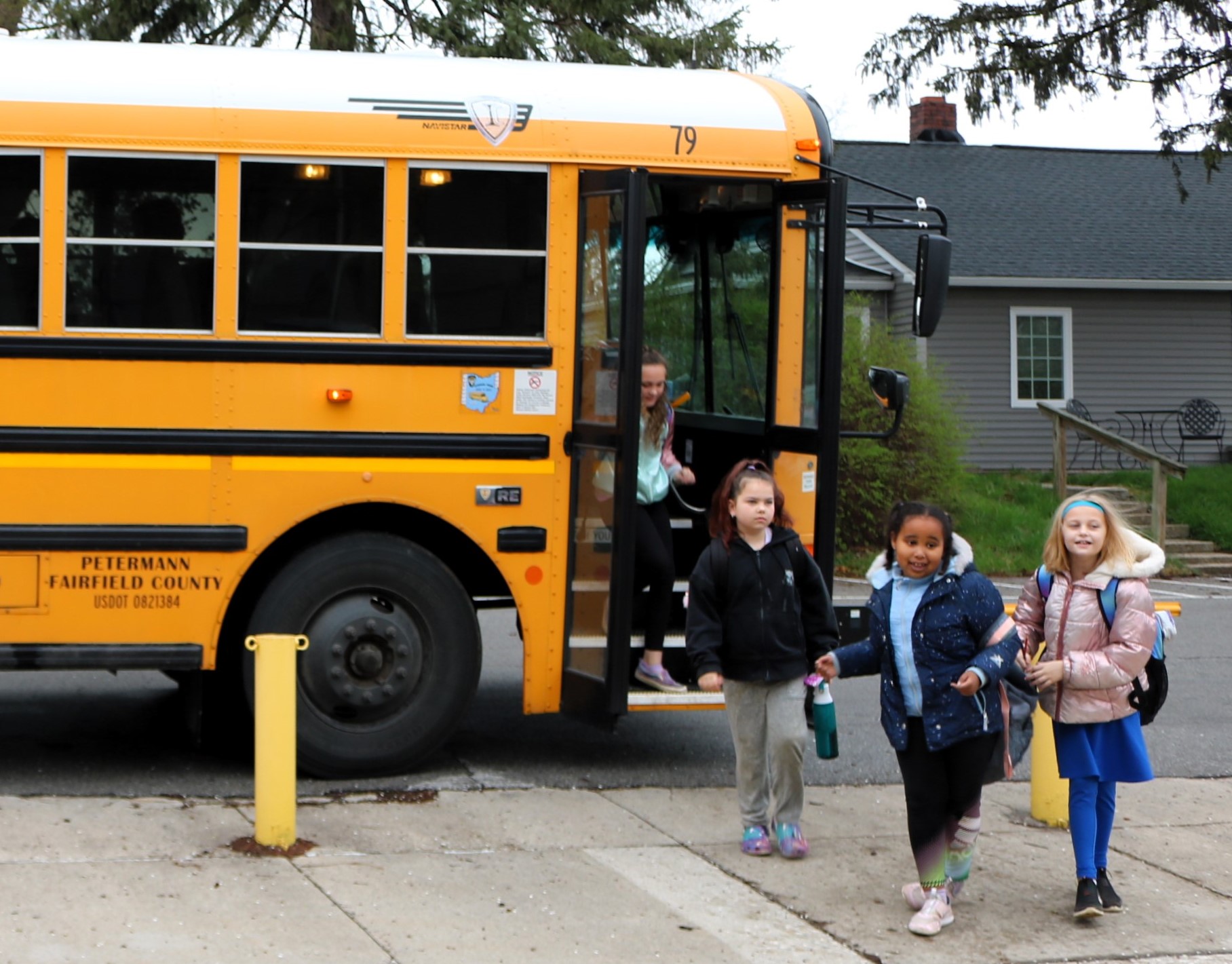 Students exiting a school bus