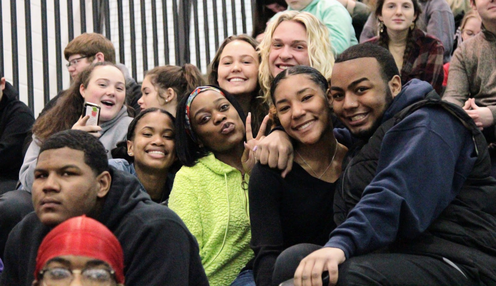 a group of high school kids smiling for the camera