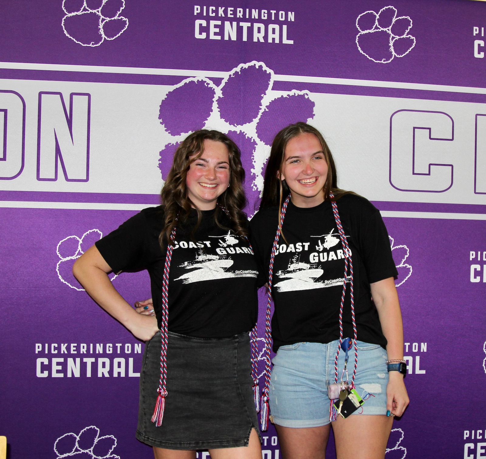 two students wearing Coast Guard tee shirts