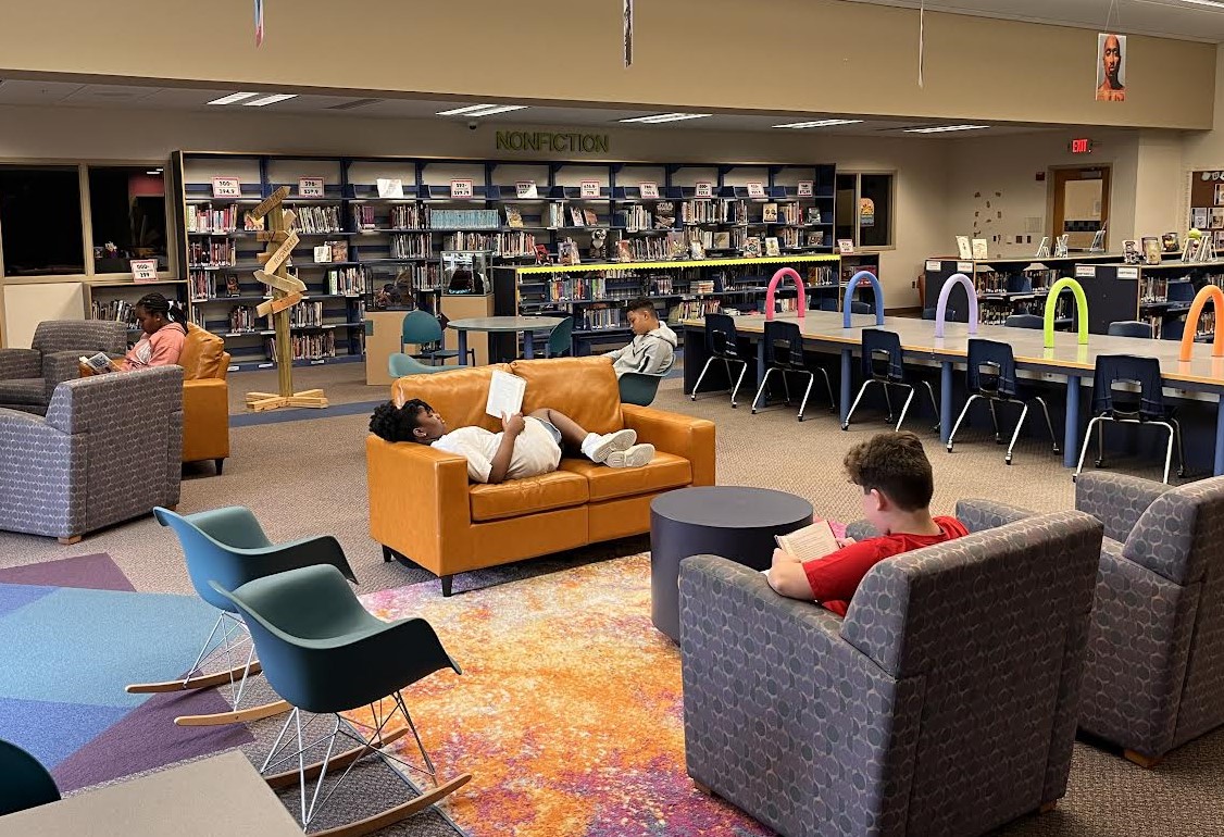 Harmon students reading in the school media center