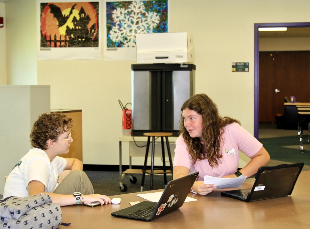 Students interacting in the Pickerington High School Central Media Center