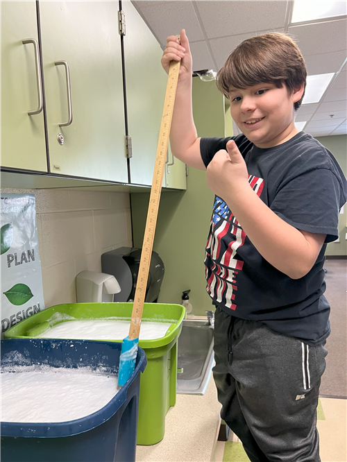 STUDENT GIVING THUMBS UP
