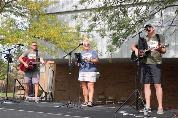 Local band, Hog Weasel Breakdown, performing at the 2022 Family & Community Festival.