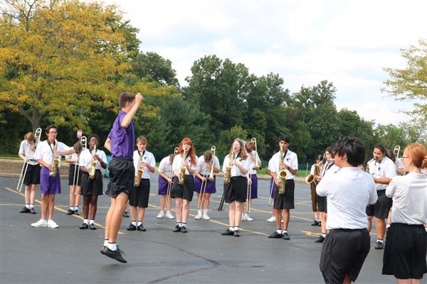 The combined Marching Band plays at the 2022 Family & Community Festival.
